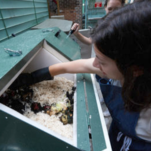 Lydia Baird working on muslin composting system