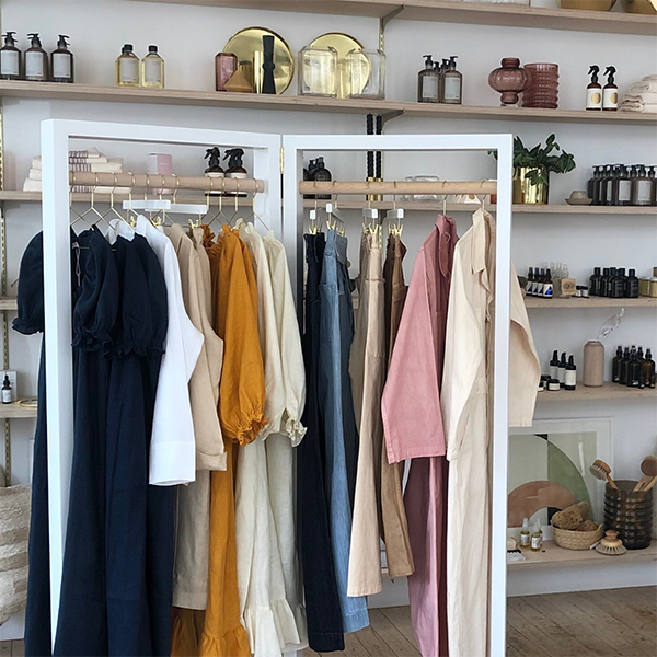 clothing on rack inside a boutique