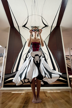 woman in avant garde white and black dress
