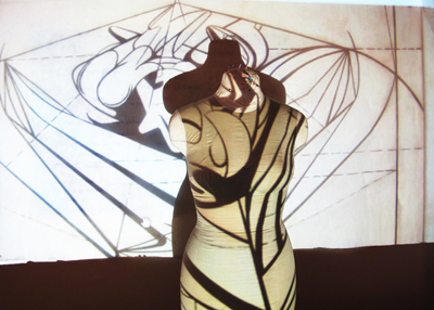 video of illustration projeted onto dress form