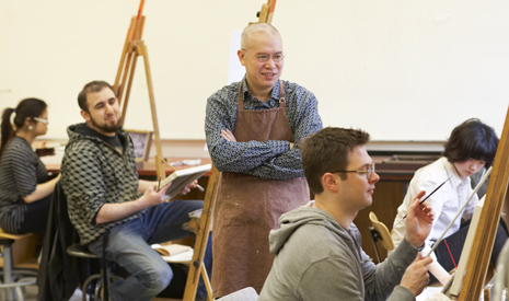 Professor with Students in Studio