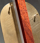 Heather Kosch - Harmonic Collection - Brass plate, Plexiglass, African padauk wood, brass screws, and leather cording.<br />
