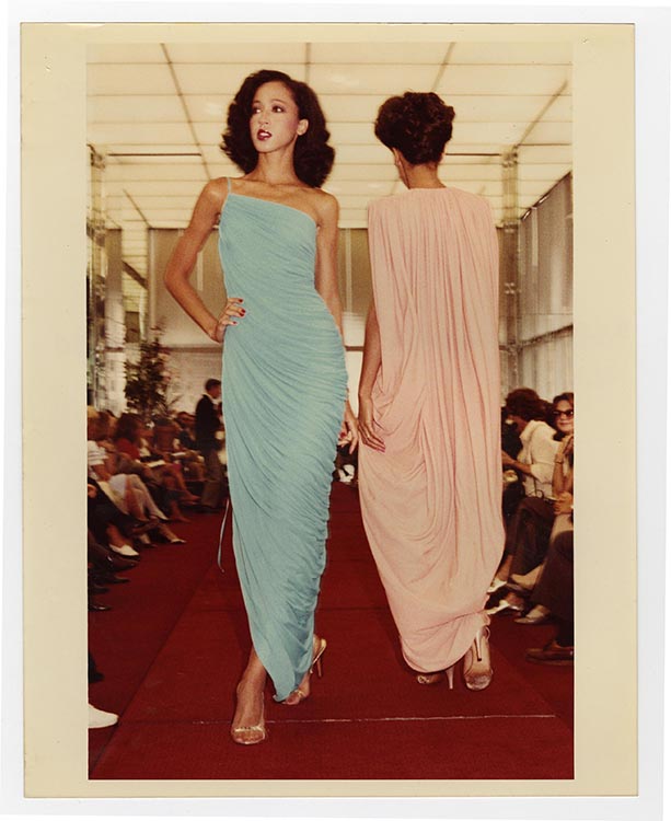models Pat Cleveland and Alva Chinn modeling evening gowns by Halston, 1980s