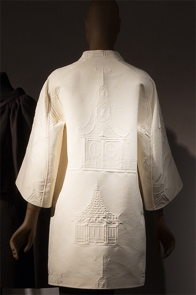Back view of a white jacket with pagoda design