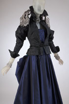 Navy blue and black dress and jacket ensemble