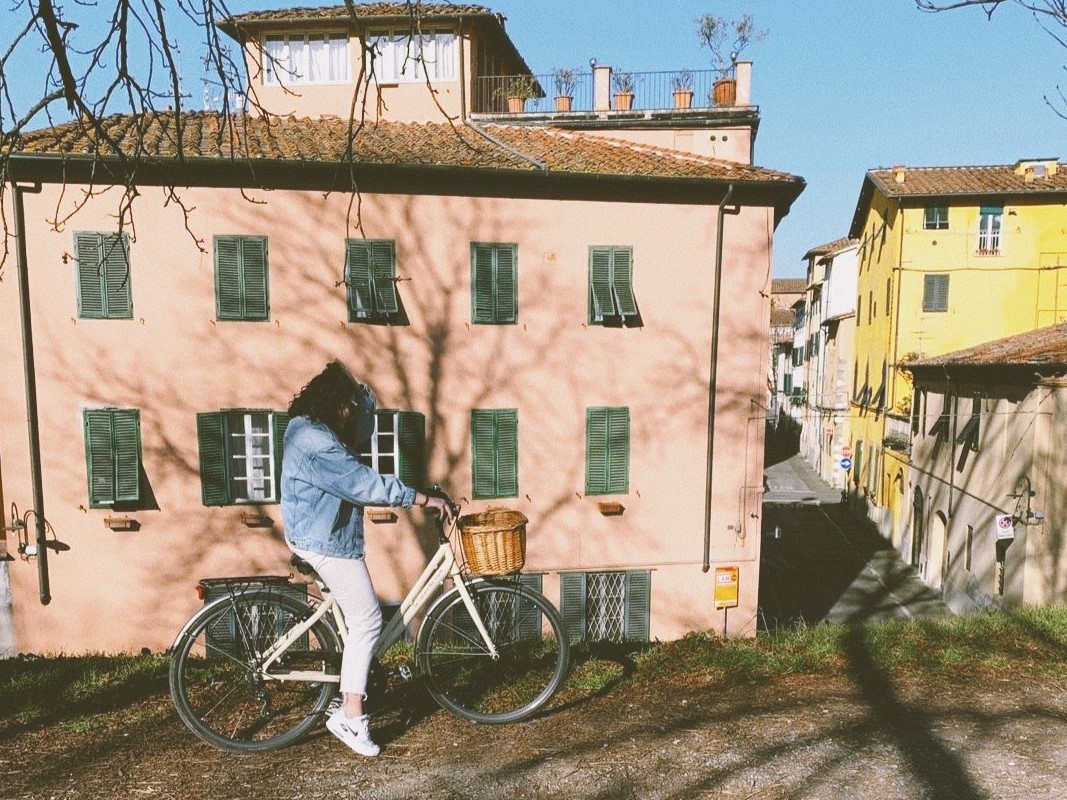 Student on bicycle in Florence