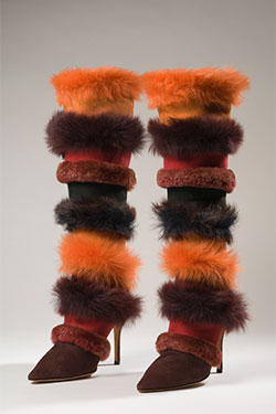 alternating red, orange, and burgundy suede and long-haired pressed shearling stiletto boots