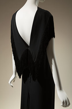 image of back of long evening gown with plunging v-back