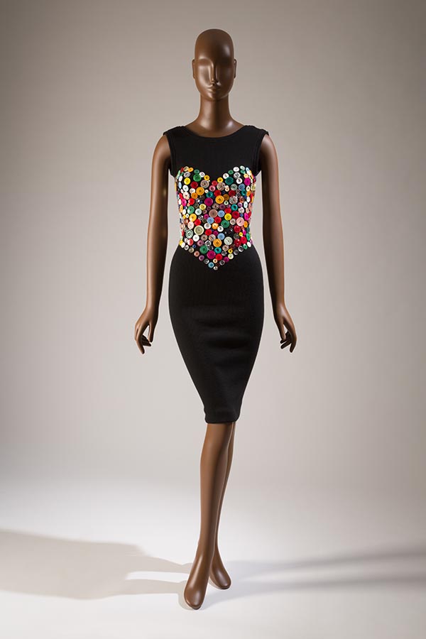 black sleeveless dress with heart bustier in multi-colored buttons