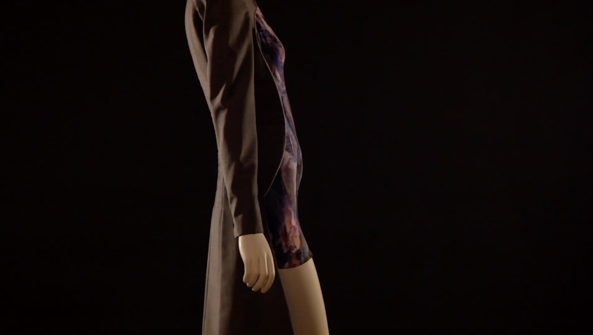 side profile of a mannequin dressed in a garment featured in the exhibition
