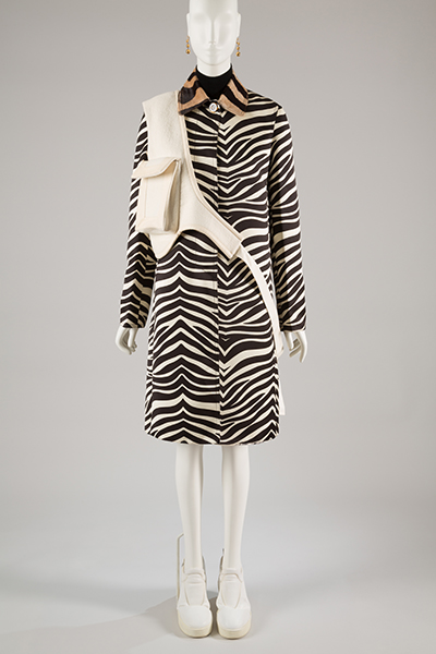 zebra striped calf-lengthe coat with white cross body bag