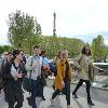 Walking across the Seine between site visits.