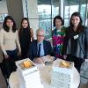 GFM students at a book signing with Didier Grumbach, President of Honour of the Fédération Français de la Couture (seated)  after his presentation on the History of International Fashion.