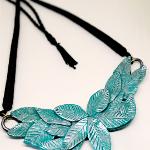 Mixed media leaf motif necklace