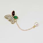 Gold, diamond, garnet, and chromium diopside brooch with pearl drop pendant