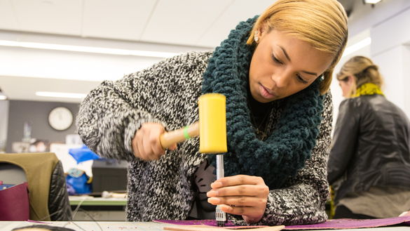 student in the accessories design lab