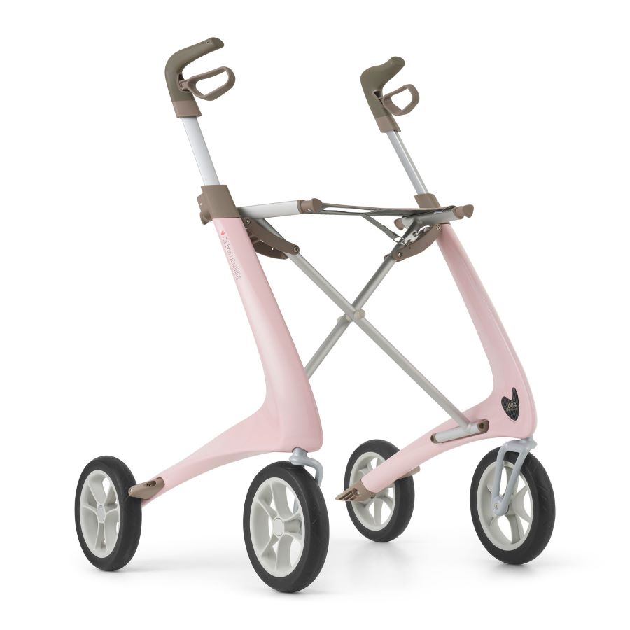 A lightweight walker with a pink frame, four large and durable black wheels, and ergonomic handles. The sleek adaptive mobility aid is designed to provide stability and independence with a minimal design.