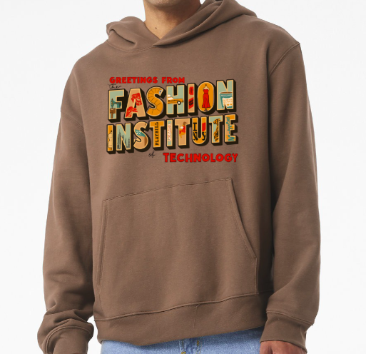 Male model wearing a black sweatshirt that reads "Greetings from the Fashion Institute of Technology" that resembles a vintage postcard.