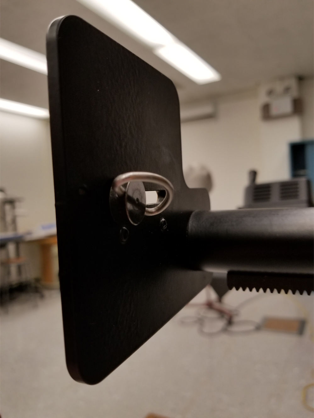 Image of the back of the Copy Stand where the screw for the camera mount is located