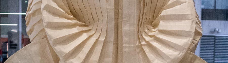 detail of pleated garment