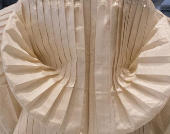 detail of pleated garment