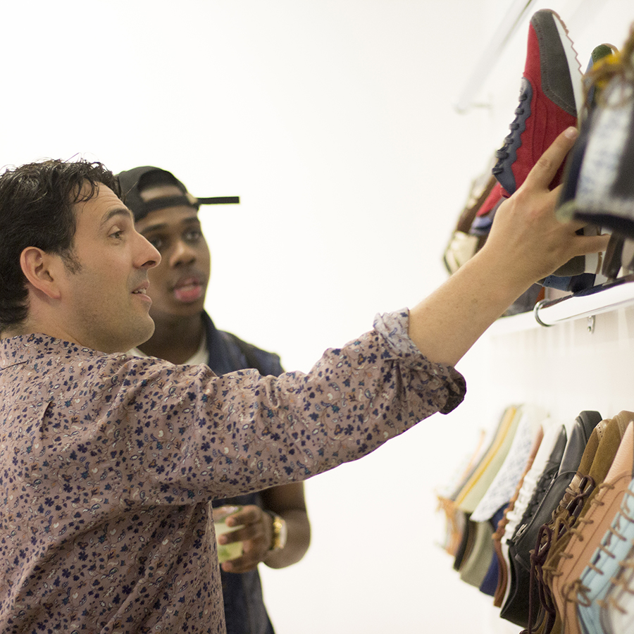 students looking at shoes