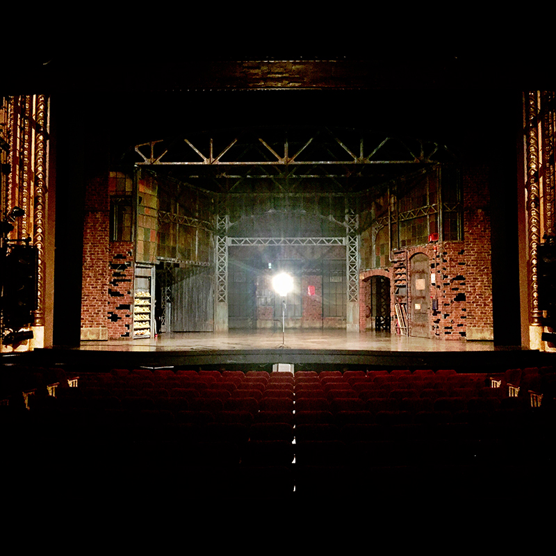 The photo of the stage is from the Broadway production of Kinky Boots (at the Hirschfeld Theatre (running 2013-2019)