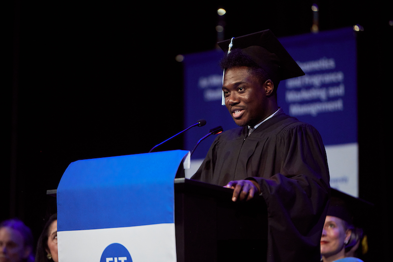 Papa Oppong delivering speech at 2023 School of Graduate Studies commencement