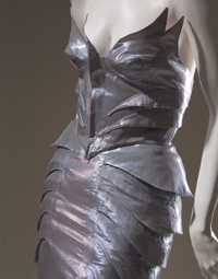 lilac and silver metallic form fitting winged bustier and skirt with fishtail train