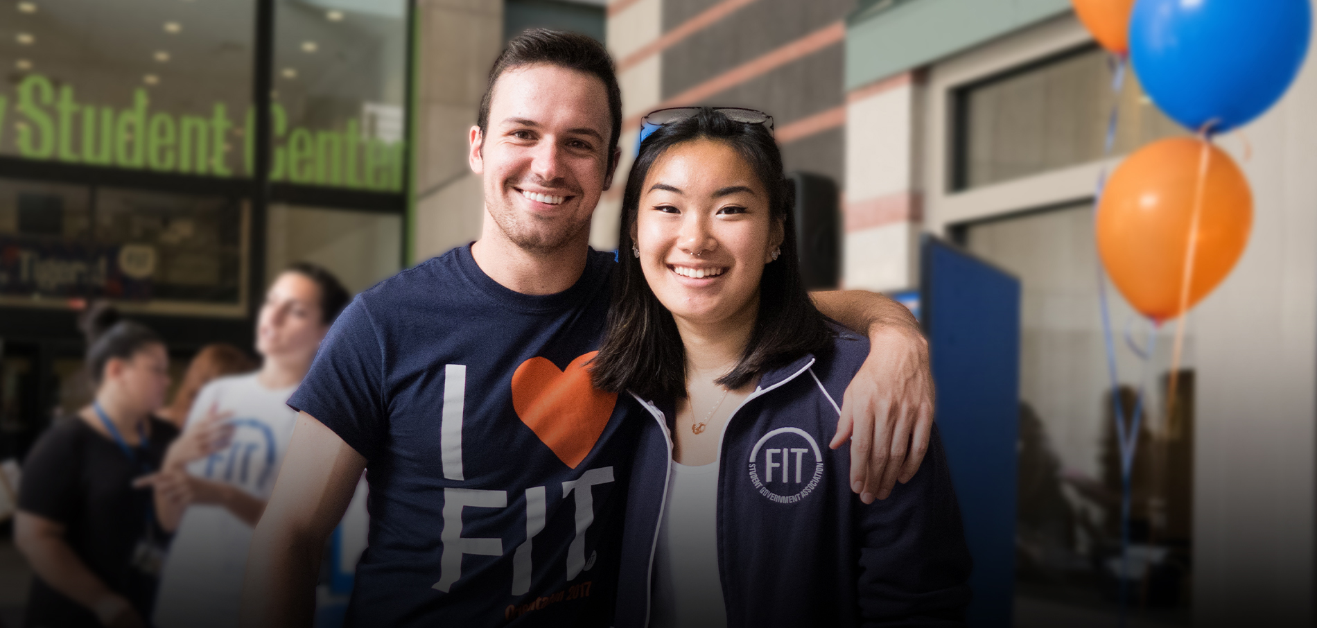 happy FIT students on campus breezeway