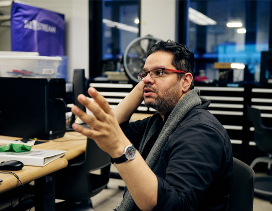Man waving his hand to express a point
