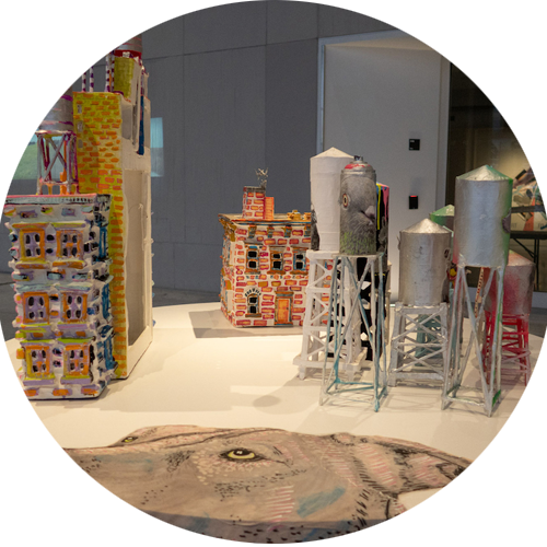 Display of miniature buildings and watertowers