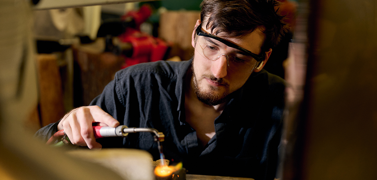 FIT student welding jewelry