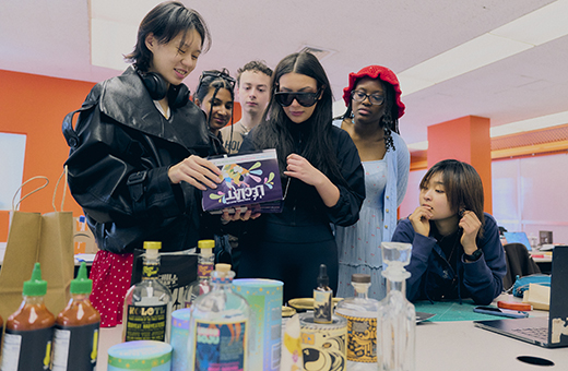 Packaging Design students looking at product design