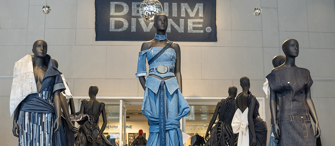 An exhibition picture from Denim Divine. Students made gowns and high-concept outfits made from upcycled denim.