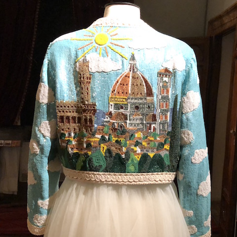 Image of back of jacket made out of sequins depicting skyline of Florence