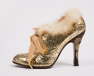 Gilt tooled leather high-heeled booties with mink trim