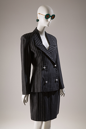 Dark grey striped women's suit with dice for buttons
