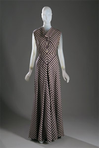 evening dress in lavender, violet, and ivory striped silk brocade