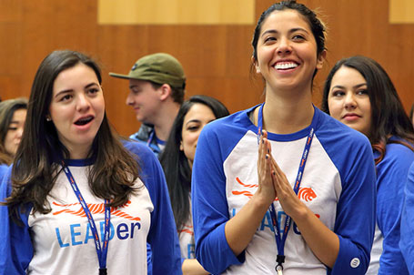 group of students wearing shirts with "leader" written on them during a group activity