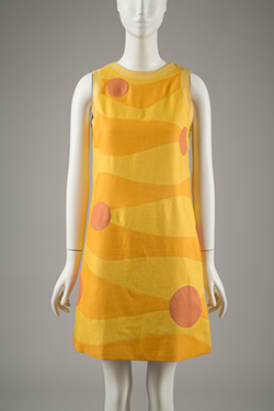 sleeveless mini dress with orange and yellow wave pattern