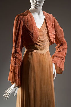 dustry orange owl draped and pleated dress