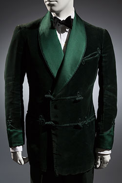 green jacket with cashmere trousers and black bowtie