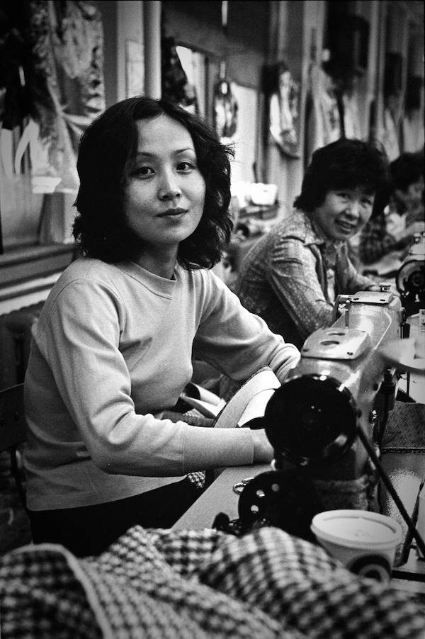 portrait of a woman at a sewing machine