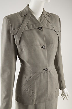 semi-fiitted suit in gray with orange windowpane check
