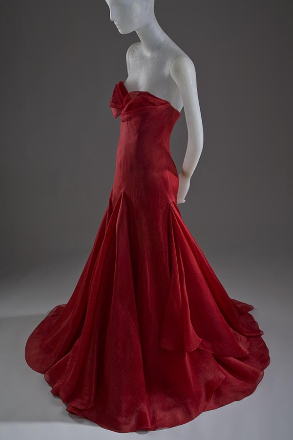 layered red silk organza with strapless petal neckline and floor length skirt