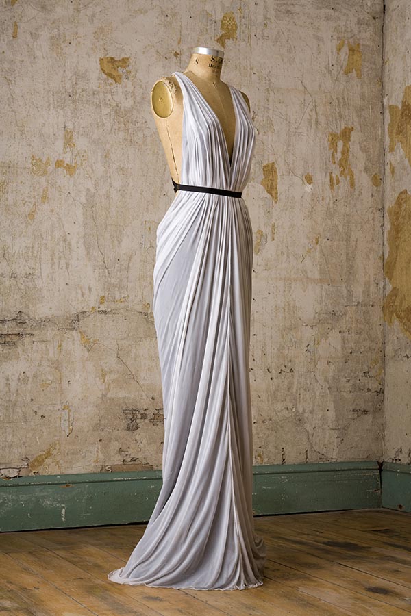 white jersey floor length sleeveless dress with deep v neck