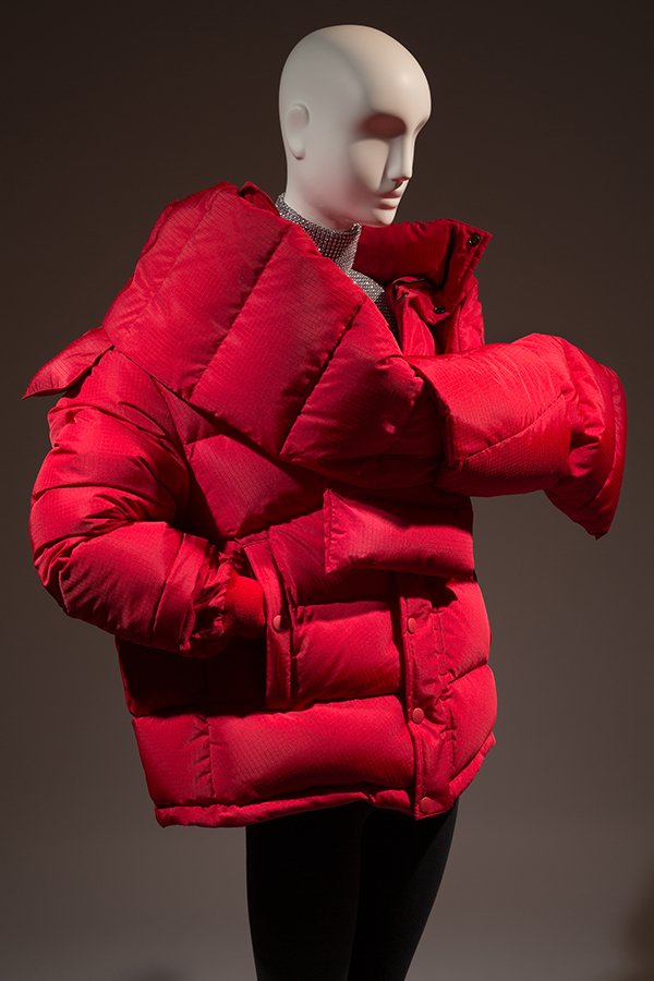 big red puffy jacket on a mannequin
