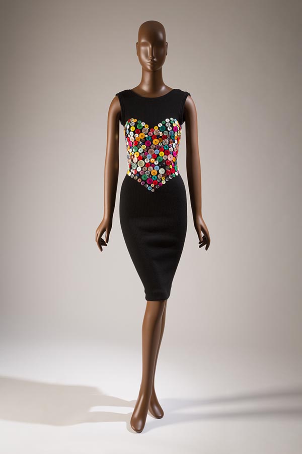 black sleeveless dress with heart bustier in multi-colored buttons 