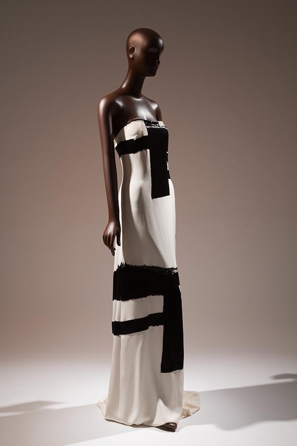white strapless floor length dress handbeaded with black micro bugle beads in a design inspired by Franze Kline